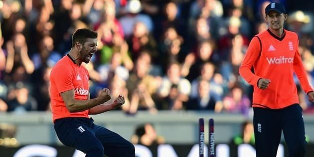 Mark Wood celebrates McCullum’s wicket