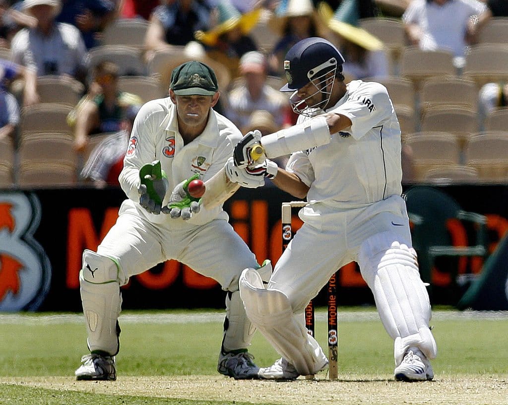 India’s Sachin Tendulkar (R) hits a stro