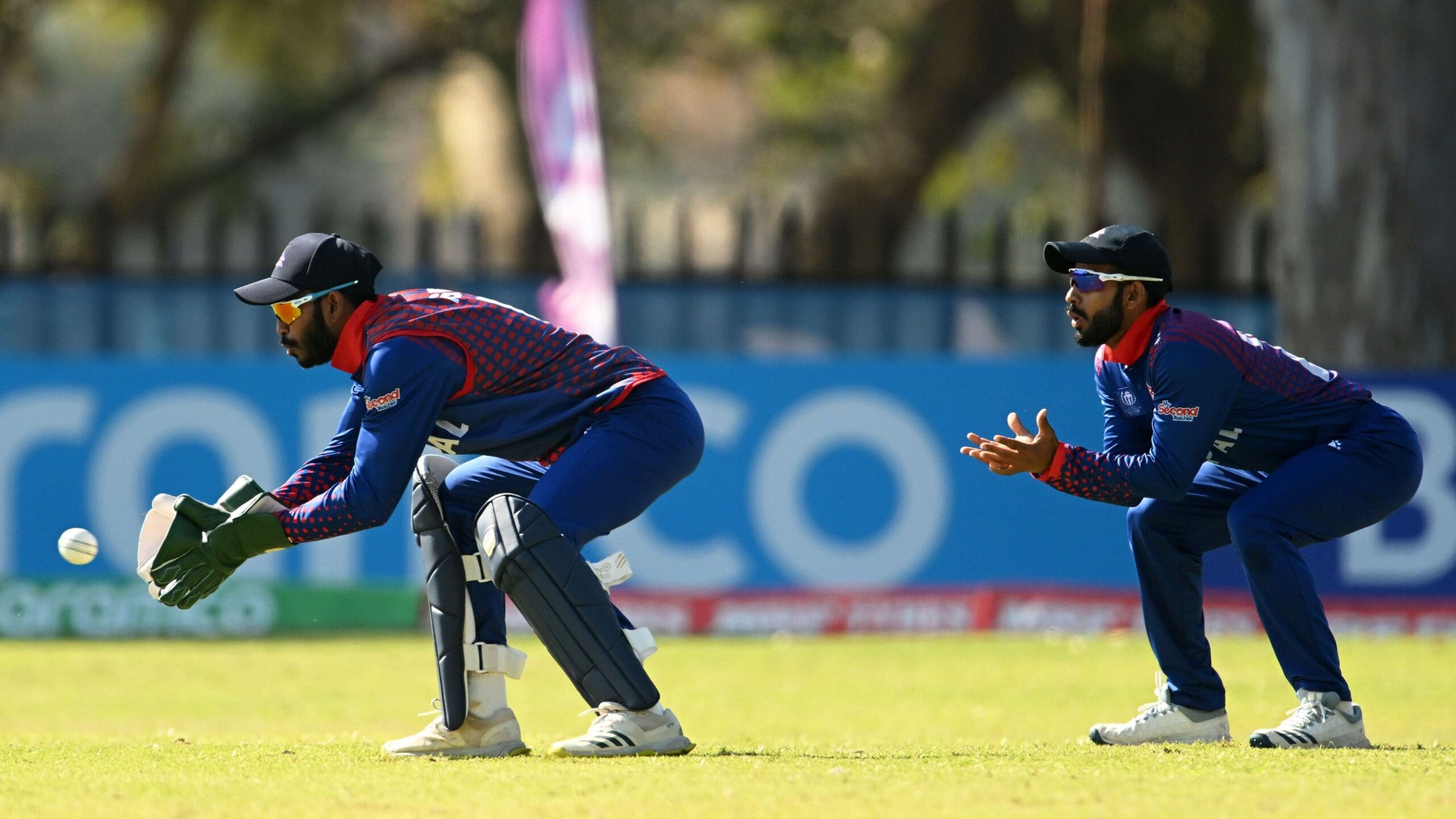 Aasif Sheikh of Nepal gathers the ball during the ICC Men’s Cricket World Cup Qualifier Zimbabwe 2023 match between Nepal and USA at Takashinga Cricket Club on June 20, 2023 in Harare, Zimbabwe_