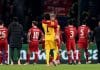 PARIS, FRANCE - MARCH 05: Harvey Elliott of Liverpool celebrates with team mate Alisson Becker after the UEFA Champions League 2024/25 Round of 16 first leg match between Paris Saint-Germain and Liverpool FC at Parc des Princes on March 05, 2025 in Paris, France. (Photo by Julian Finney/Getty Images)